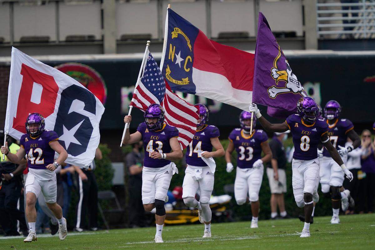 East Carolina takes the field during an NCAA college football game magainst Central Florida in Greenville, N.C., Saturday, Sept. 26, 2020.