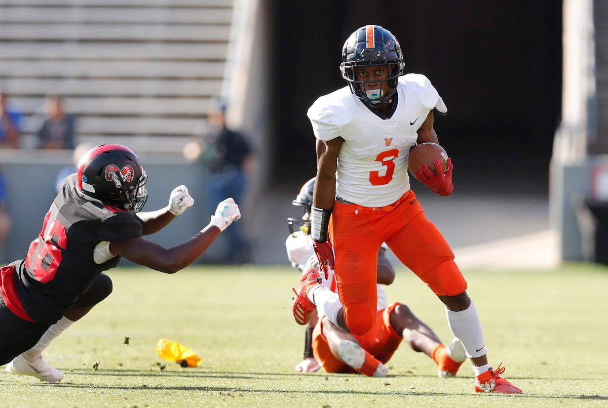 Vance’s Daylan Smothers’ (3) long run is called back for a holding penalty during the first half of Rolesville High School’s game against Vance High School in the NCHSAA 4AA state championship at Carter-Finley Stadium in Raleigh, N.C., Saturday, May 8, 2021.