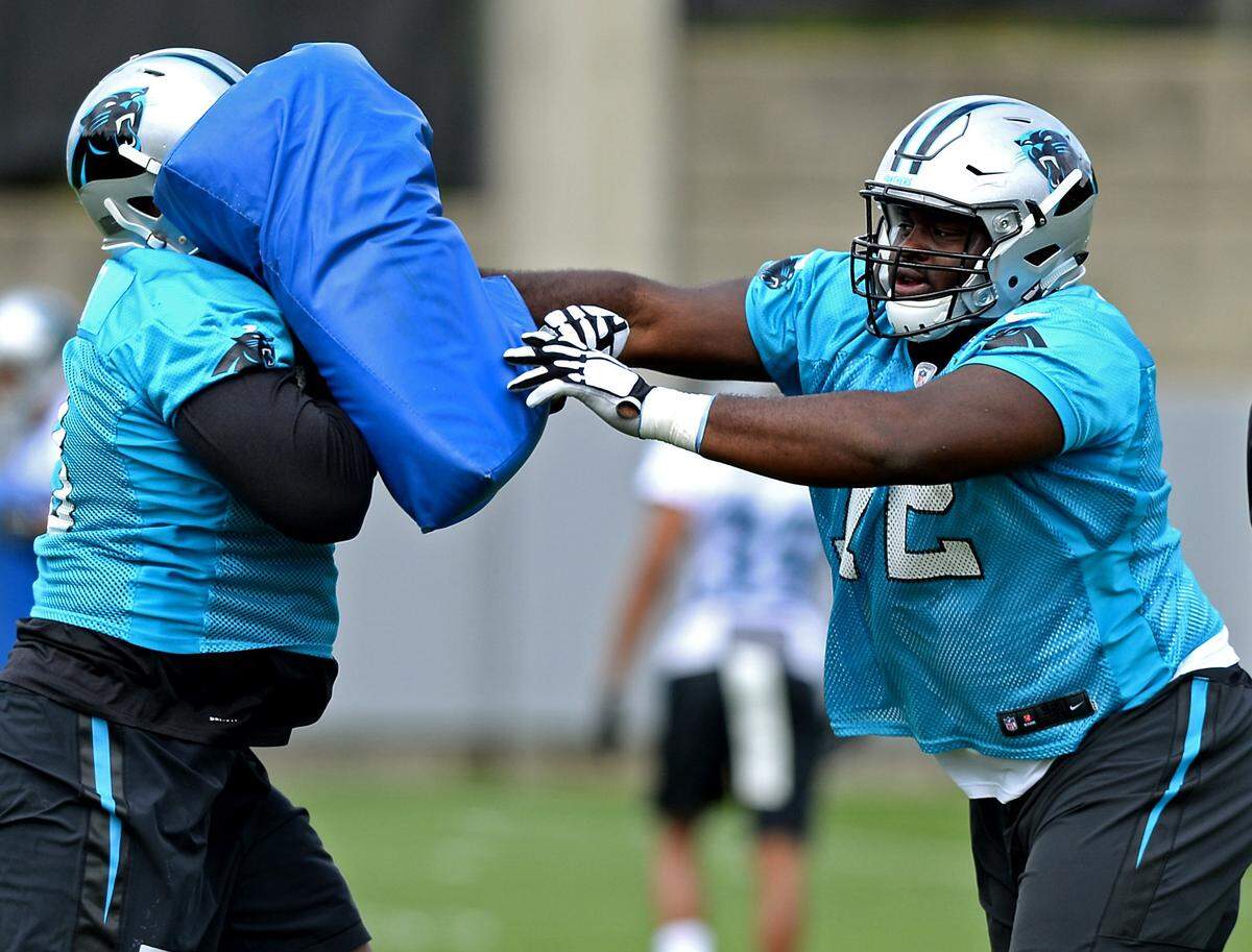 After playing sparsely as a rookie, Carolina Panthers offensive lineman Taylor Moton, right, could become a starter at guard with the departure in free agency of Andrew Norwell.
