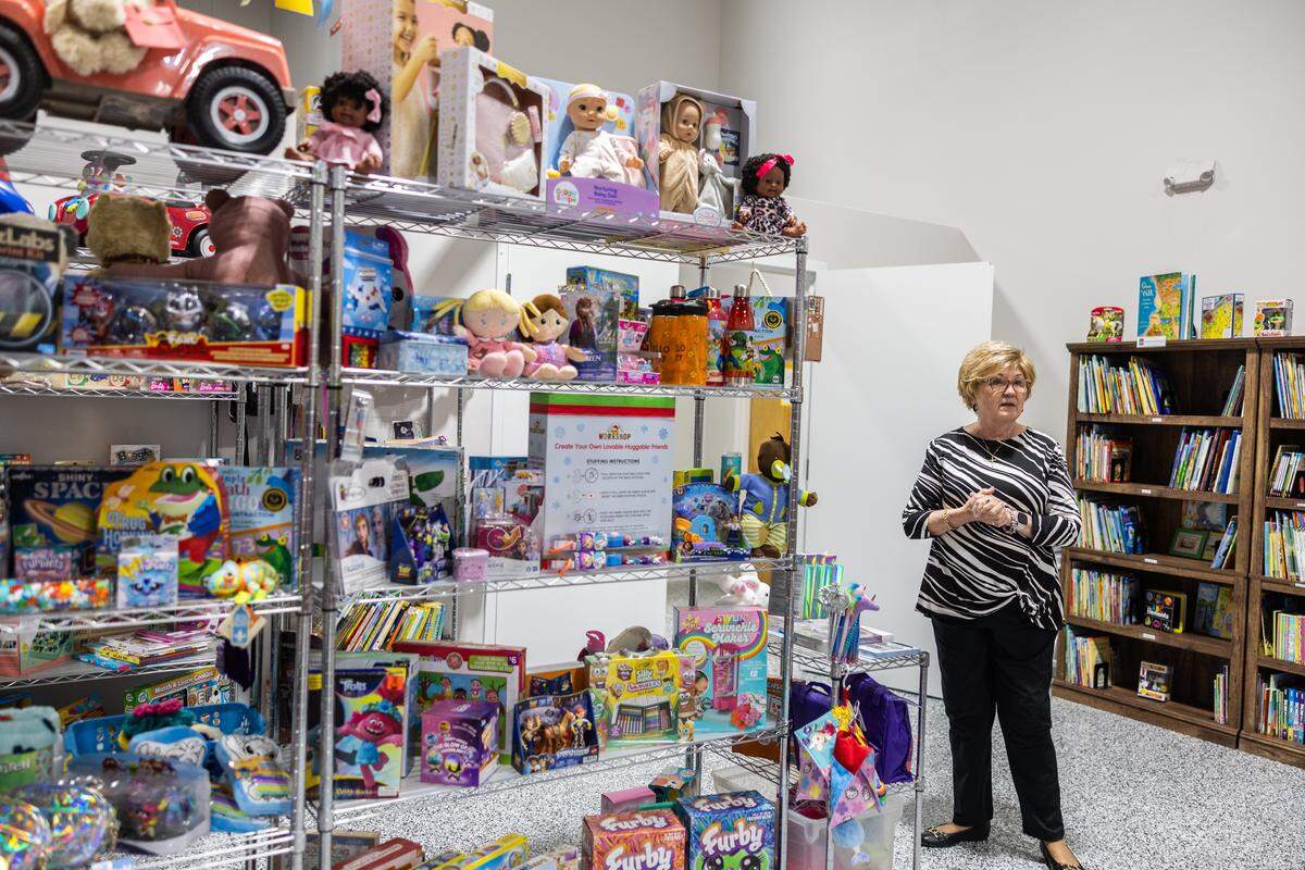 Executive Director Linda Morris gives a tour of Bridge of Hearts in Mooresville, N.C., on Wednesday, December 10, 2025. The organization annually provides birthday gifts and health and hygiene kits to about 1,000 unhoused and impoverished children, and nursery items to pregnant teens.