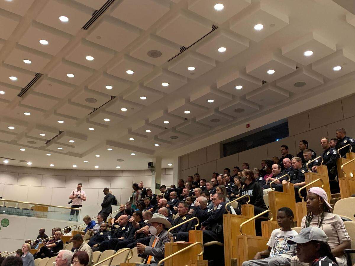 Officers filled the Charlotte City Council chambers Monday, Sept. 26, 2022 in support of renaming the bridge at the intersection of West W.T. Harris Boulevard and I-85 the Officer Mia Goodwin Memorial Bridge.