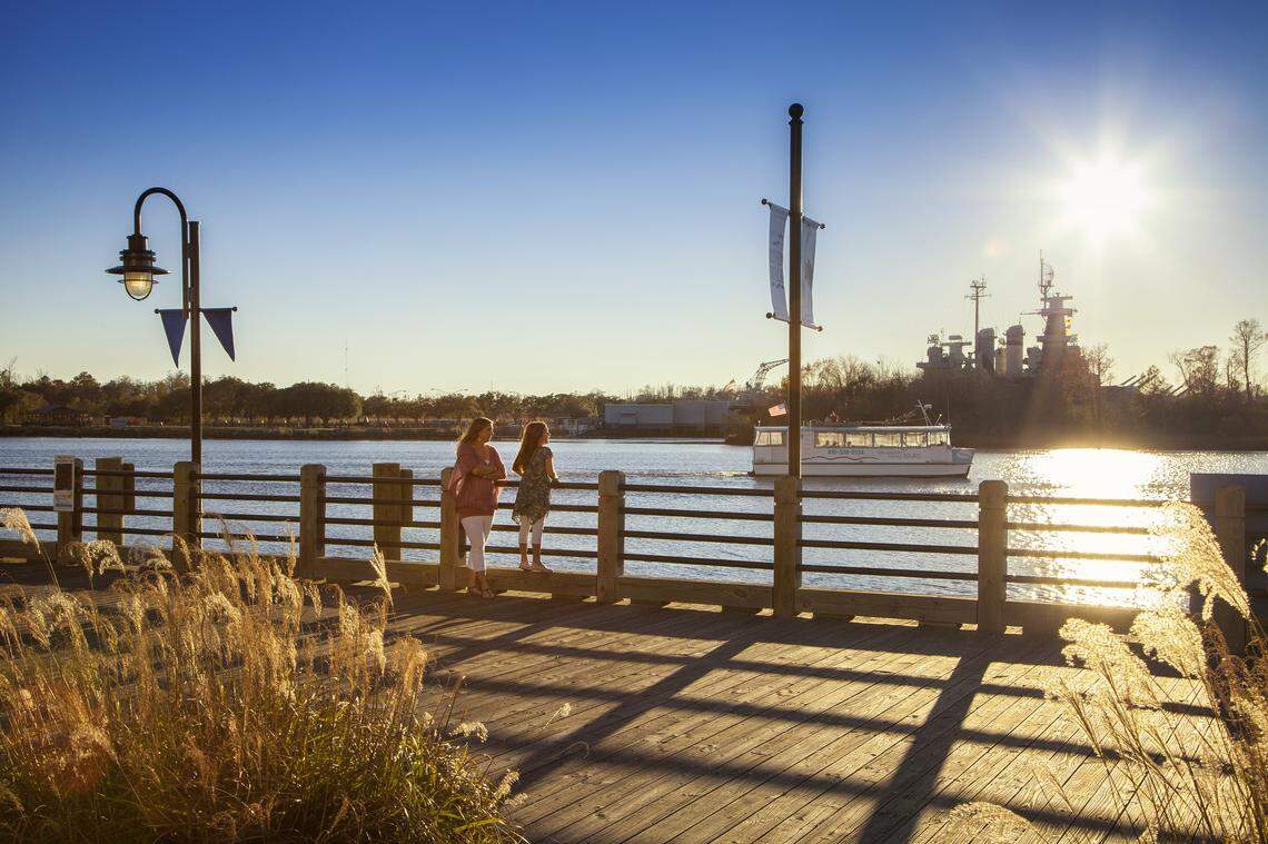 Stroll the Riverwalk and enjoy the crisp fall area while visiting the Battleship North Carolina in Wilmington.