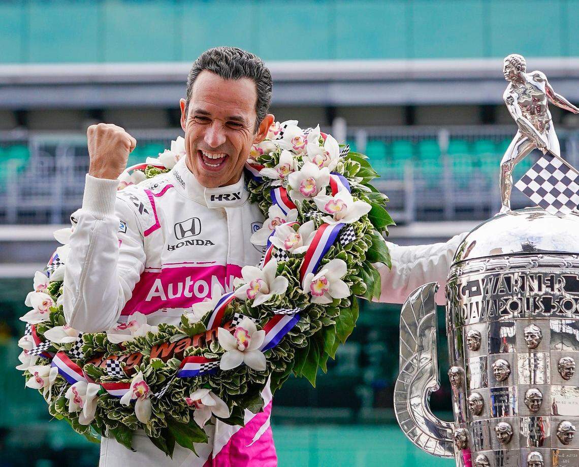 Helio Castroneves, who will run in the 2025 NASCAR Daytona 500, celebrates winning the 105th Indianapolis 500 on May 31, 2021, tying the record for most wins in Indy 500 history.