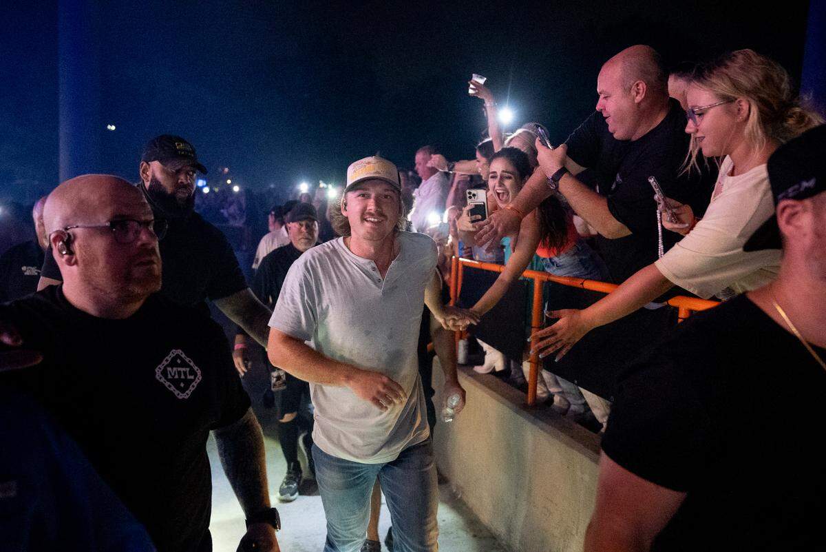 Morgan Wallen makes his way through the crowd during his “Dangerous Tour” on Thursday night at PNC Music Pavilion.