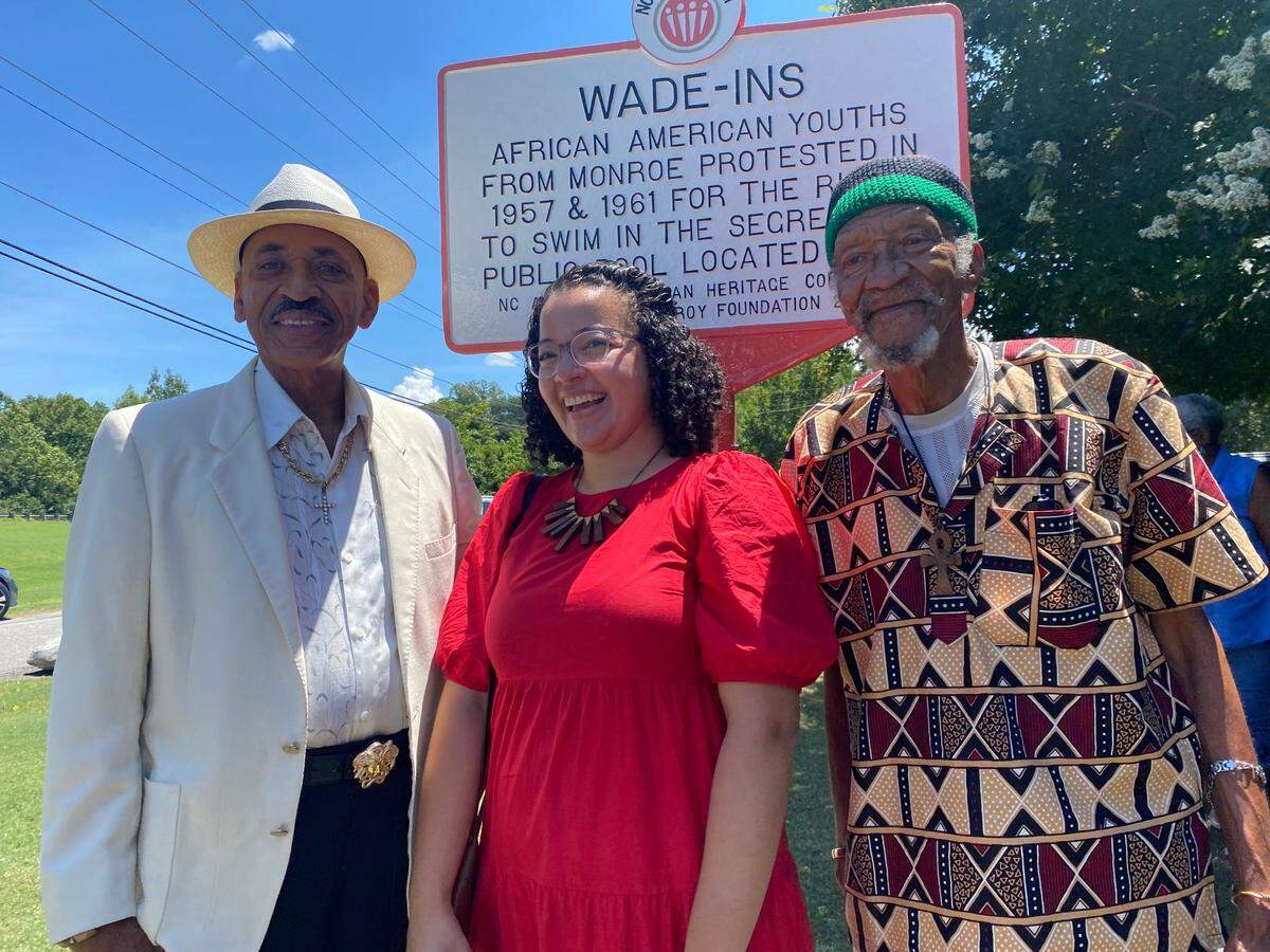 Jonathan Blount, Monroe native and Essence Magazine co-founder, left; Adrienne Nirde, associate director at the NC African American Heritage Commission, middle; and Yousef Crowder, protester from 1957, right. The three attended the Monroe Country Club historic marker ceremony on Thursday, July 28.