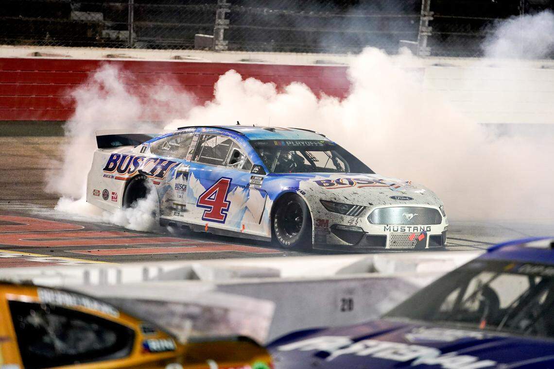 Kevin Harvick (4) celebrates a win at the NASCAR Cup Series auto race, Sunday, Sept. 6, 2020, in Darlington, S.C. (AP Photo/Chris Carlson)