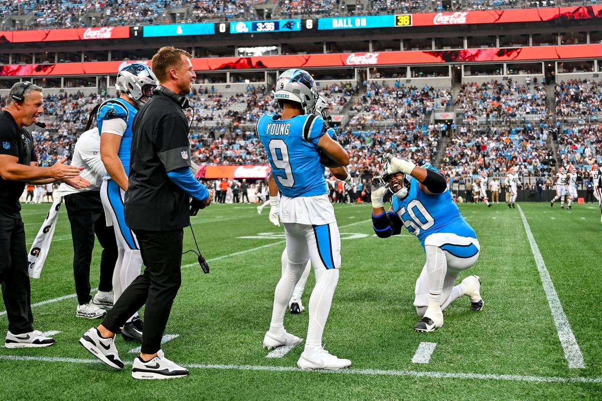 The Carolina Panthers quarterback Bryce Young and offensive guard Robert Hunt celebrate a touchdown during their preseason game against The Cleveland Browns at The Bank of America Stadium in Charlotte, NC, Friday August 8, 2025.