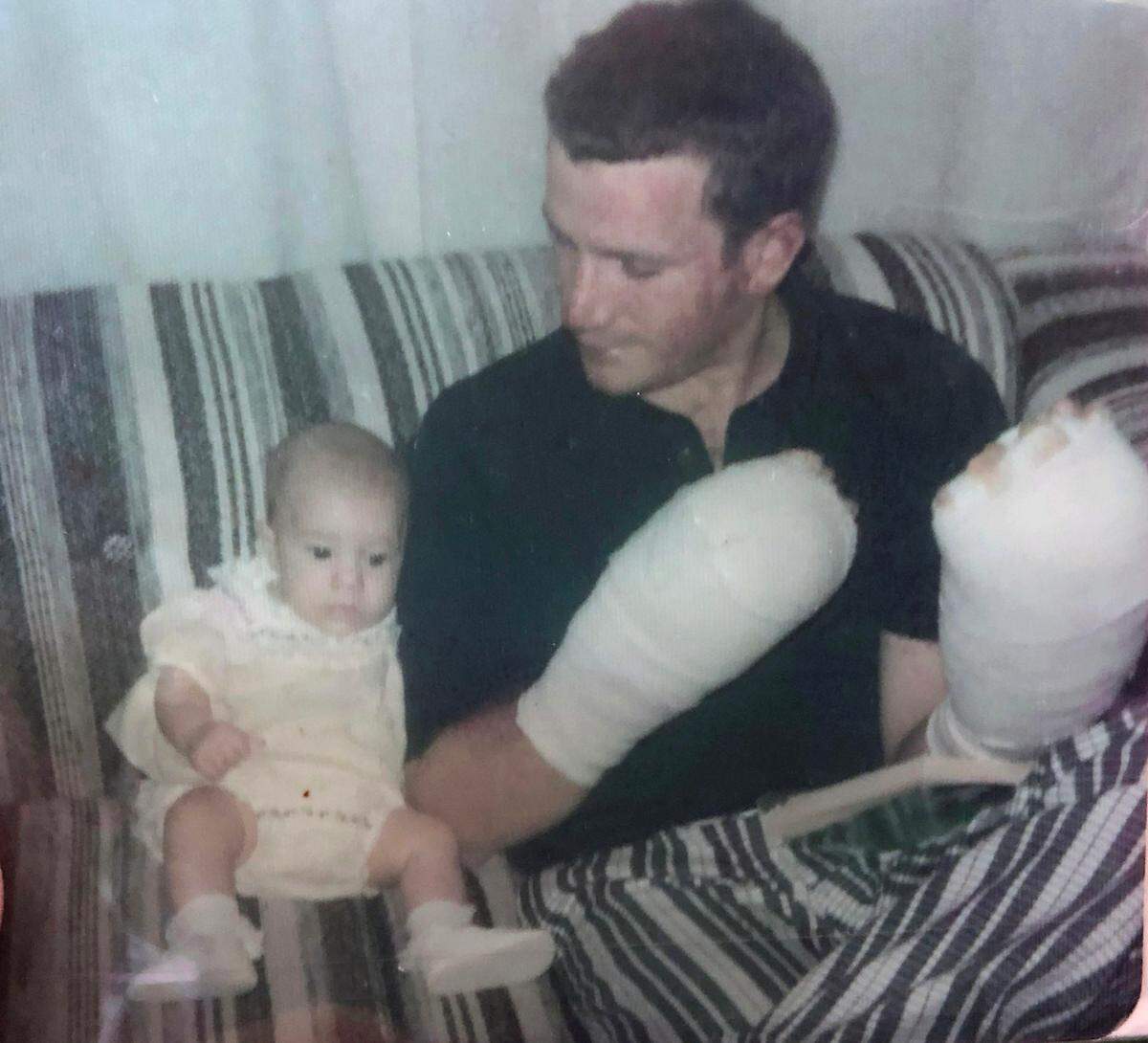 Bob Burnham, photographed with his young daughter not long after the crash.