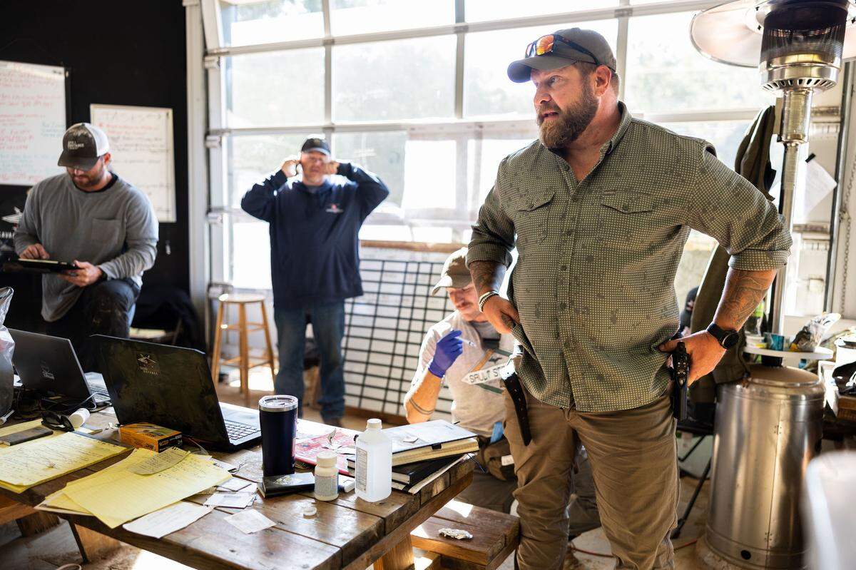 Adam Smith gets a B12 shot while he works at Savage Operations Center inside of a Harley Davidson store in Swannanoa, N.C. on Tuesday, October 8, 2024.