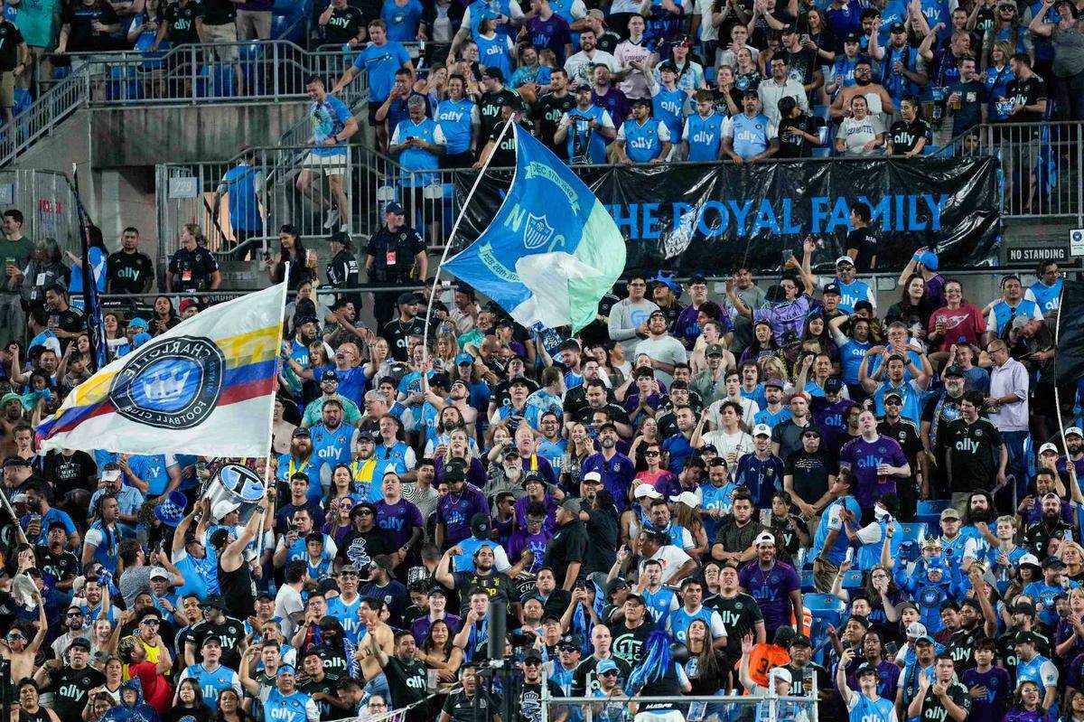 Charlotte FC fans react to the tying goal by Charlotte FC midfielder Brandon Cambridge (not pictured) during the second half against the Chicago Fire at Bank of America Stadium.