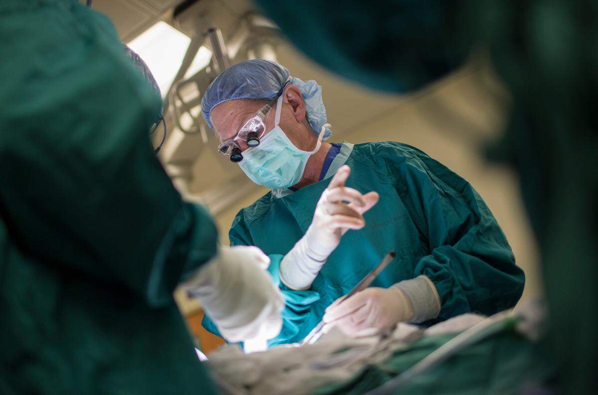 Dr. Allan Kirk, a surgeon for Duke Health, performs a kidney transplant.