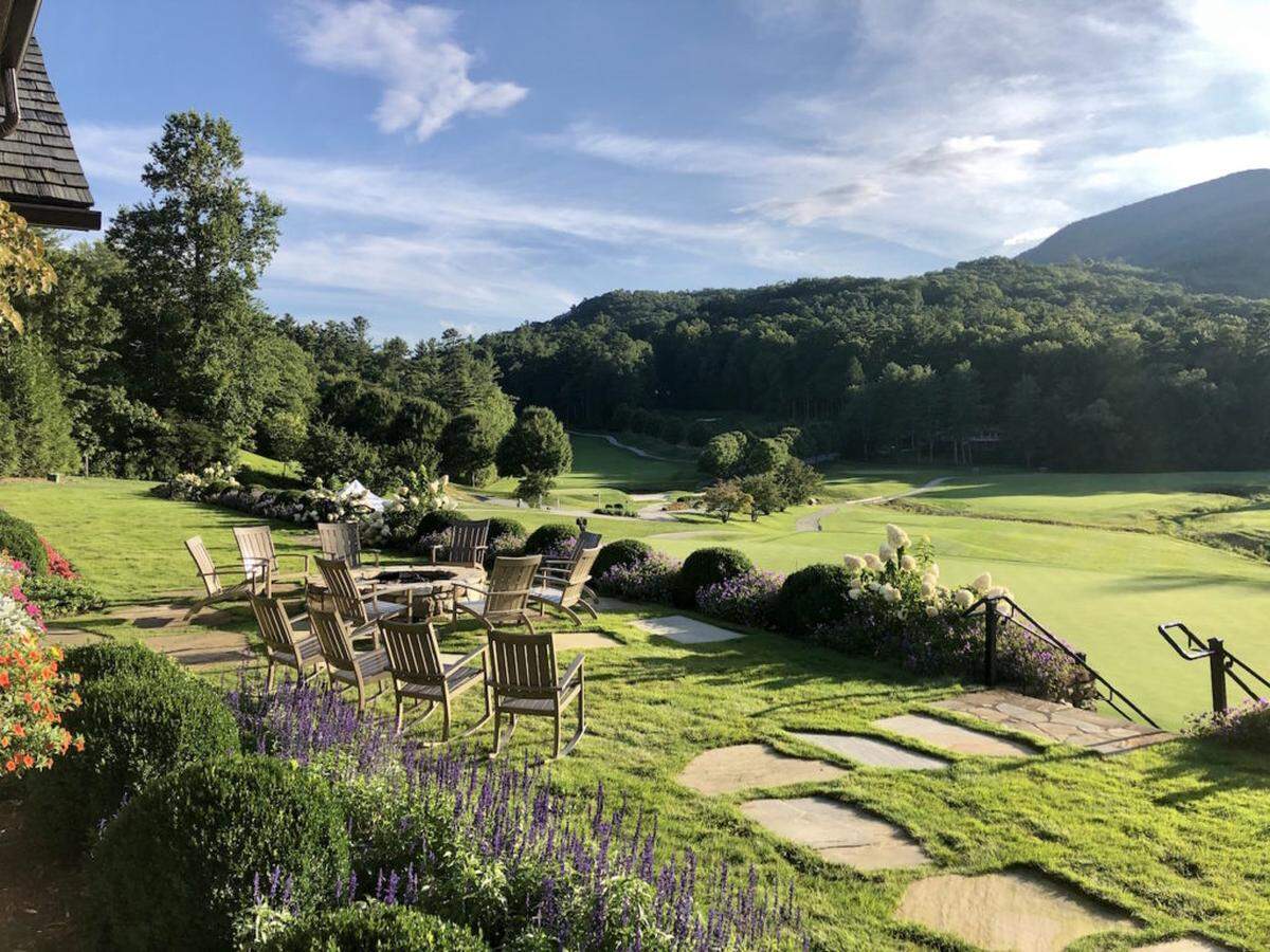 Grab an Adirondack chair on the lawn on the Greystone Inn and take in the views.