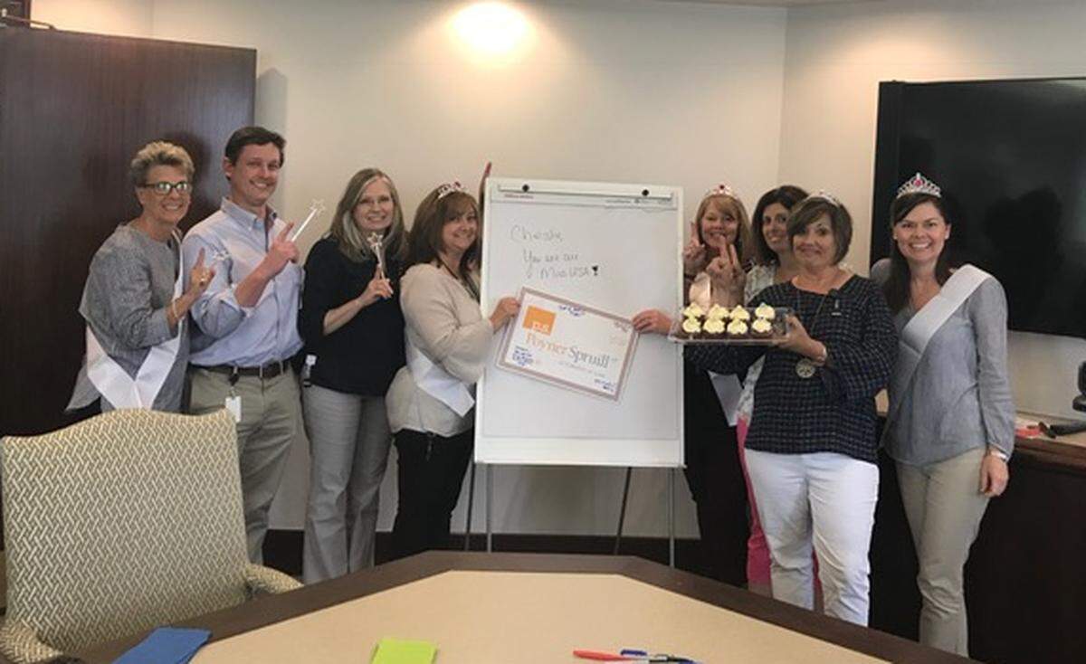 Staff at Poyner Spruill law firm, where the new Miss USA Cheslie Kryst is an attorney, gathered with tiaras, sashes and Insomnia cookies on Thursday, hours before Kryst won the Miss USA title.
