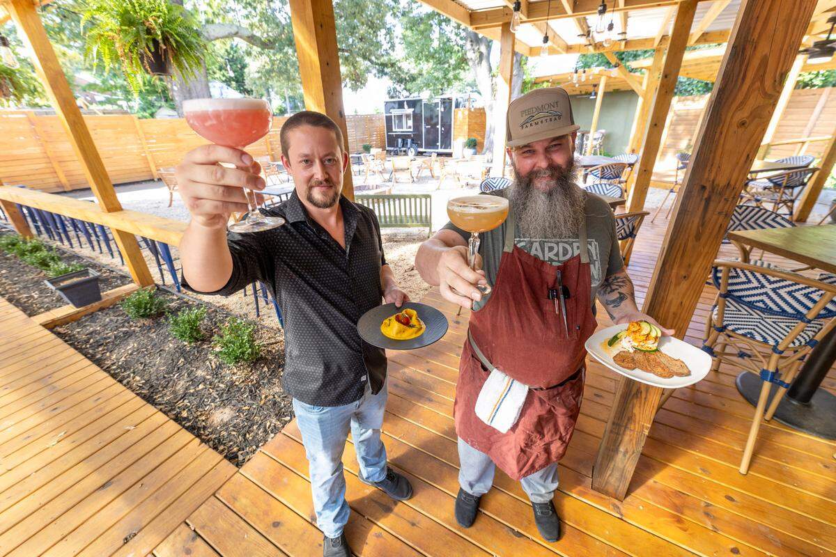 Taylor Daniel and Kyle Gaddas on the patio at The Bottle Tree in Belmont, NC.