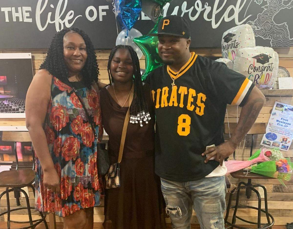 Jovontay Williams with his mother, Christa, left, and younger sister, middle. Williams died in Charlotte-Mecklenburg Police custody Monday, June 13.