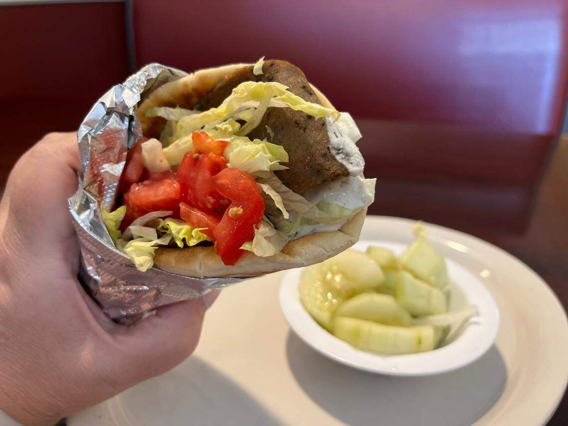 A gyro and a side of cucumber and onion salad at Miki’s Restaurant. 