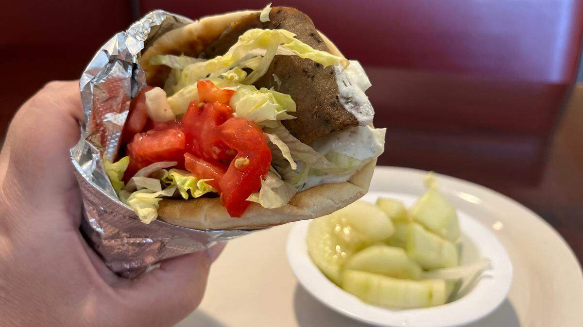 A gyro and a side of cucumber and onion salad at Miki’s Restaurant.
