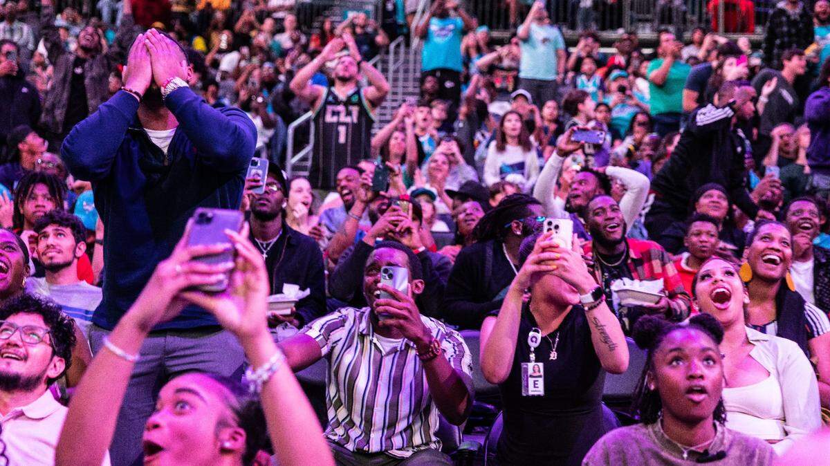 Fans react as Brandon Miller is announced the No. 2 draft pick during Charlotte Hornets 2023 NBA Draft Party at the Spectrum Center in Charlotte, N.C., on Thursday, June 22, 2023.