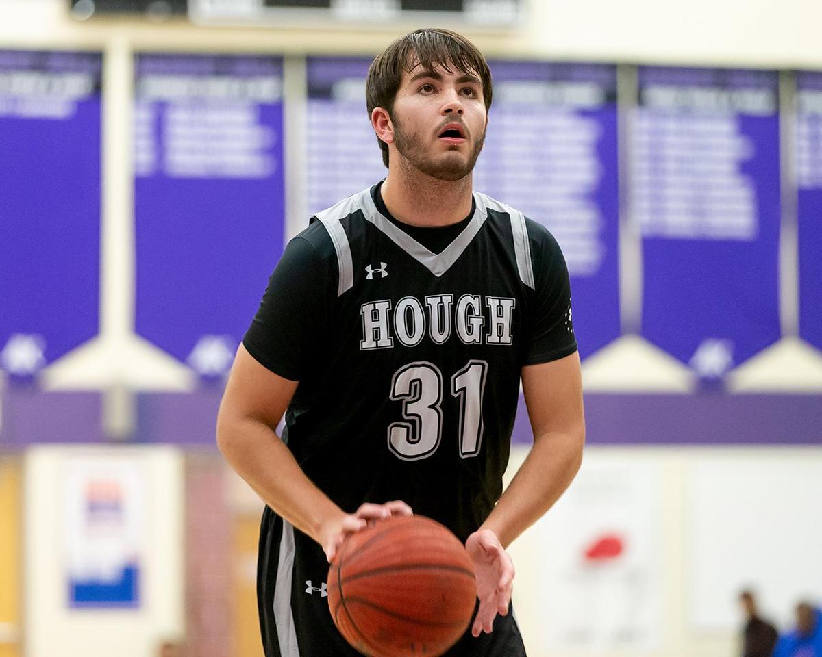 Hough’s Beau Maye (31) readies for the free throw at Hough Tuesday.