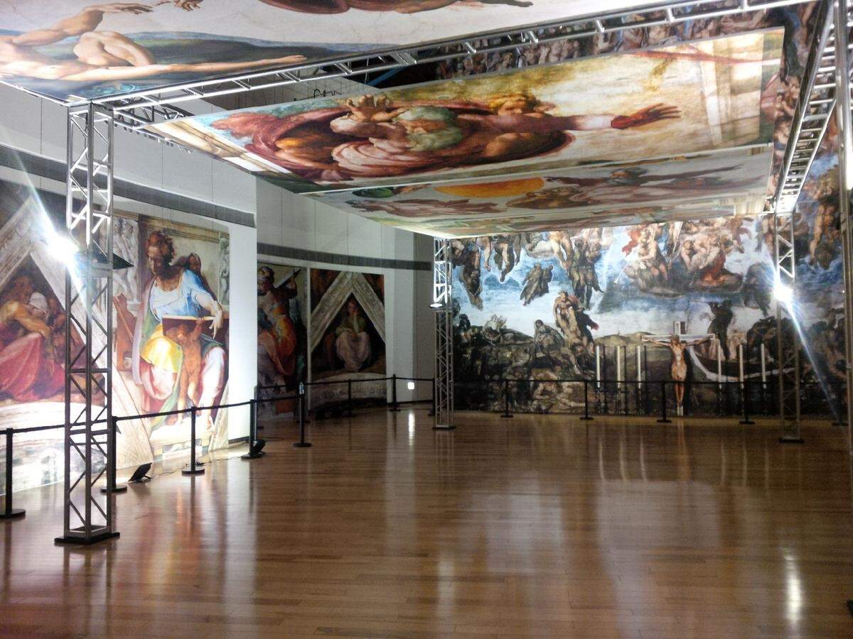 Highlights of Michelangelo’s Sistine Chapel exhibit include an intimate look at The Creation of Adam.