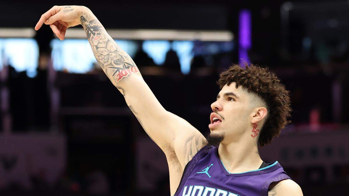 Charlotte Hornets guard LaMelo Ball holds his release after shooting a three-point shot during action against the Dallas Mavericks at Spectrum Center in Charlotte, NC on Monday, January 20, 2025.