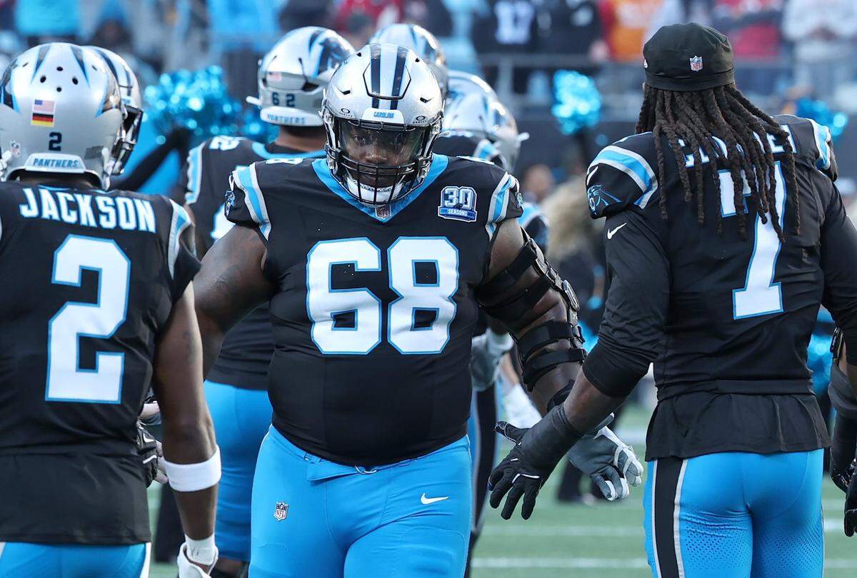 Carolina Panthers guard Damien Lewis is introduced prior to action against the Tampa Bay Buccaneers on Dec. 1, 2024. The Buccaneers defeated the Panthers in overtime 26-23. 