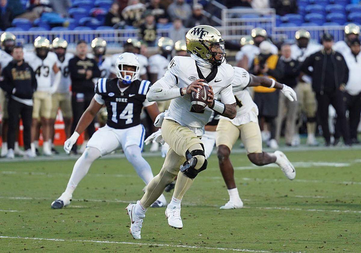 Wake Forest Demon Decons quarterback Robby Ashford looks to pass during the first half of the game against the Duke Blue Devils at Wallace Wade Stadium on November 29, 2025 in Durham, North Carolina. (Photo by Alex Halloway/Getty Images)
