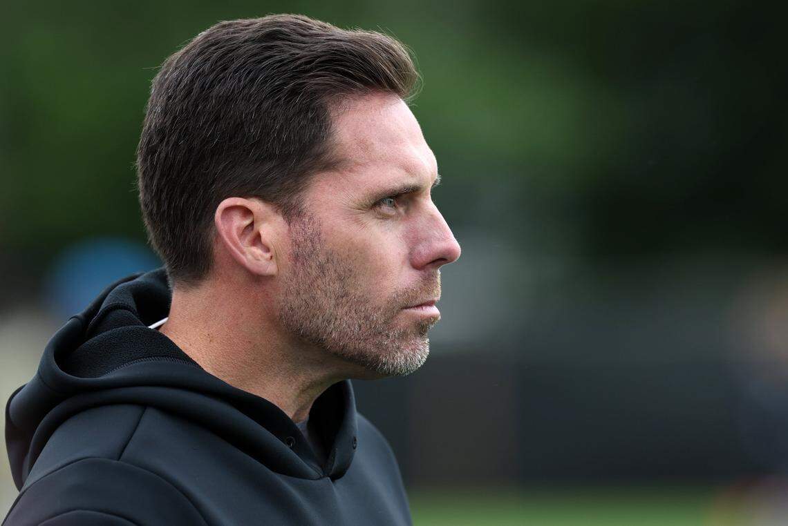 Carolina Panthers general manager Dan Morgan watches the team run through drills during a 2025 practice.