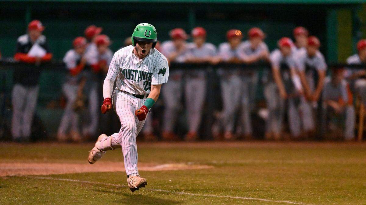 Myers Park’s Jaxon West (25) reeacts after hitting a RBI single duing a varsity baseball game against South Mecklenburg, Tuesday, April 22, 2025, in Charlotte, N.C.  (Charlotte Observer/Matt Kelley)