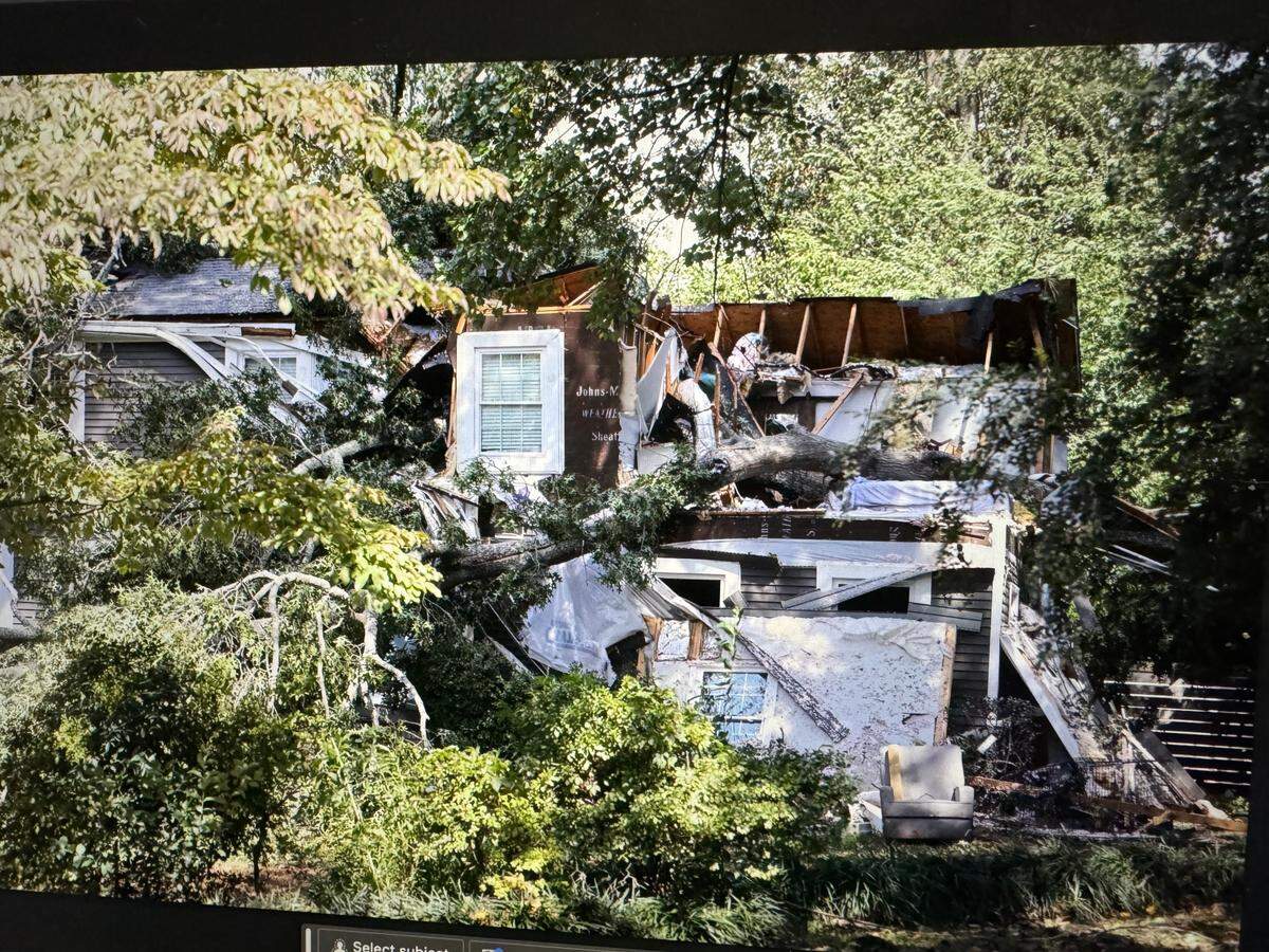 Rock Hill and Charlotte firefighters worked early Friday morning to pull a couple from a home on Poinsett Drive in Rock Hill that was crushed by a large tree.