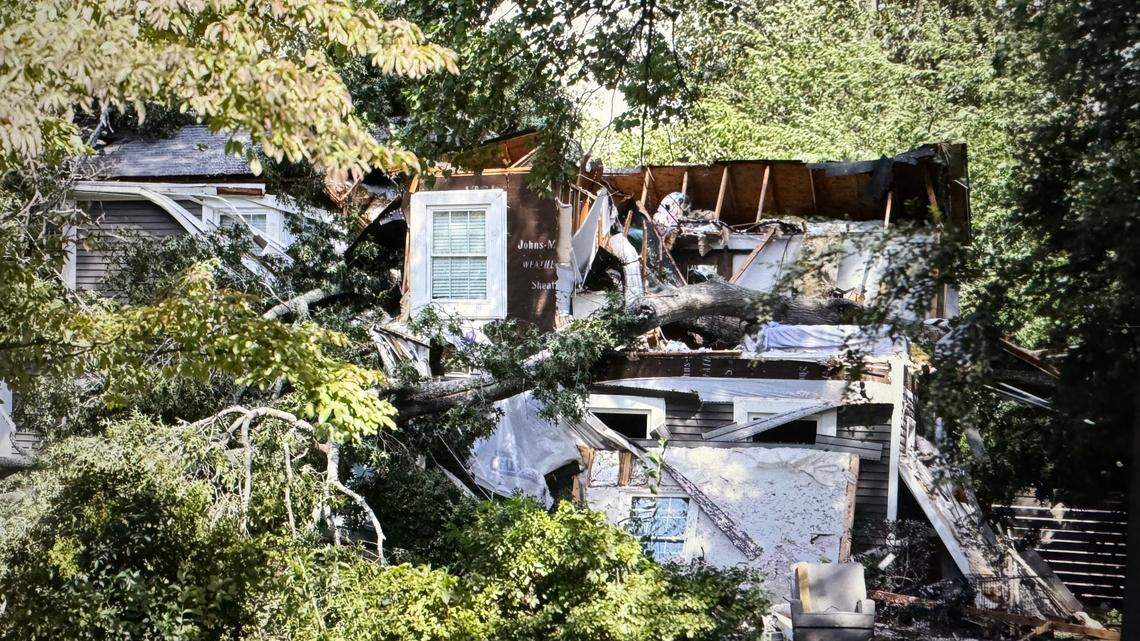 Rock Hill and Charlotte firefighters worked early Friday morning to pull a couple from a home on Poinsett Drive in Rock Hill that was crushed by a large tree.