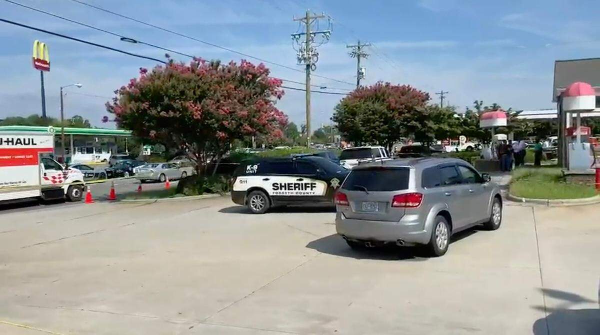 Charlotte-Mecklenburg Police were a part of a multi-agency effort that left a murder suspect fatally shot and a law enforcement officer injured in Clemmons NC on Friday, Aug. 5.