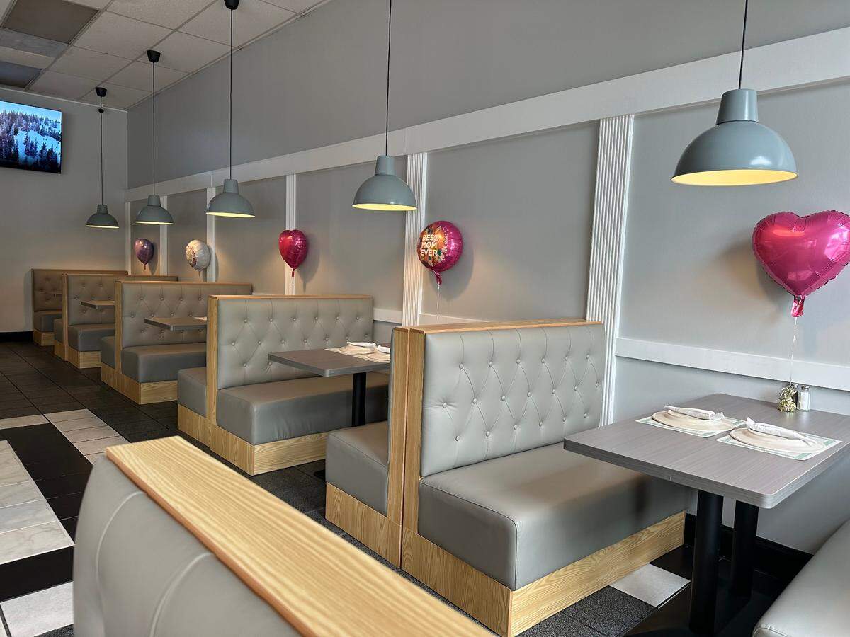 Curry Junction’s dining space offers tables and booth seating.