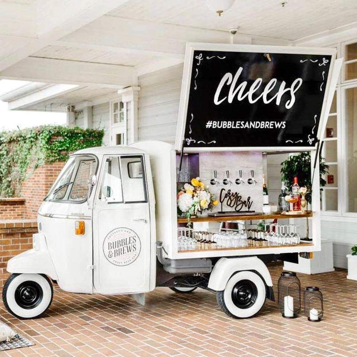 This Italian Piaggio Ape mini-truck has seven taps and can pull up to any party.