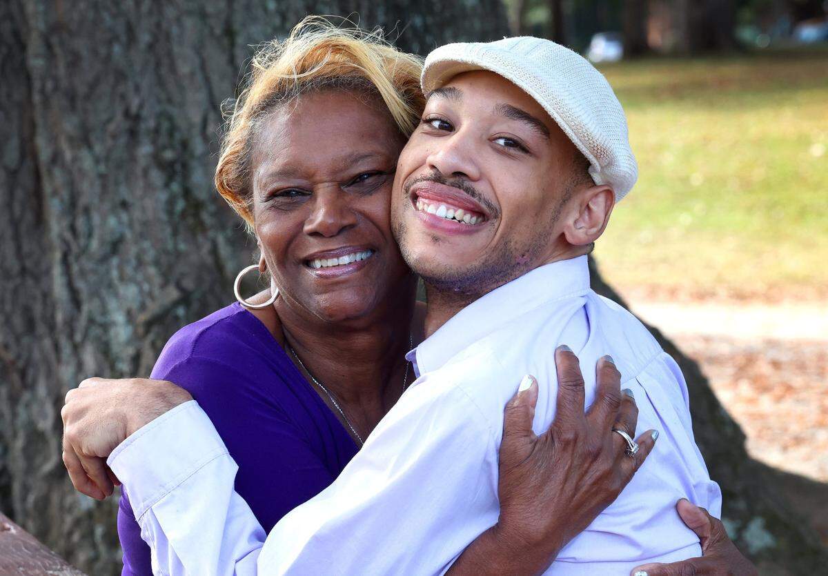 Saundra Adams, left and her grandson, Chancellor Lee Adams, right, celebrate Cahncellor’s 25th birthday at Freedom Park in Charlotte. Chancellor’s mother, Cherica Adasm was shot four times and died 28 days later. Chanxcellor is the son of former Carolina Panthers wide receiver Rae Carruth.