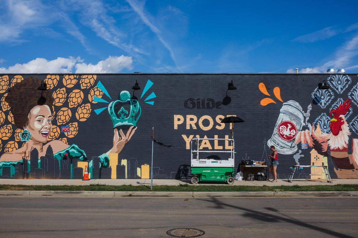 Carla Garrison-Mattos created the murals outside Gilde.