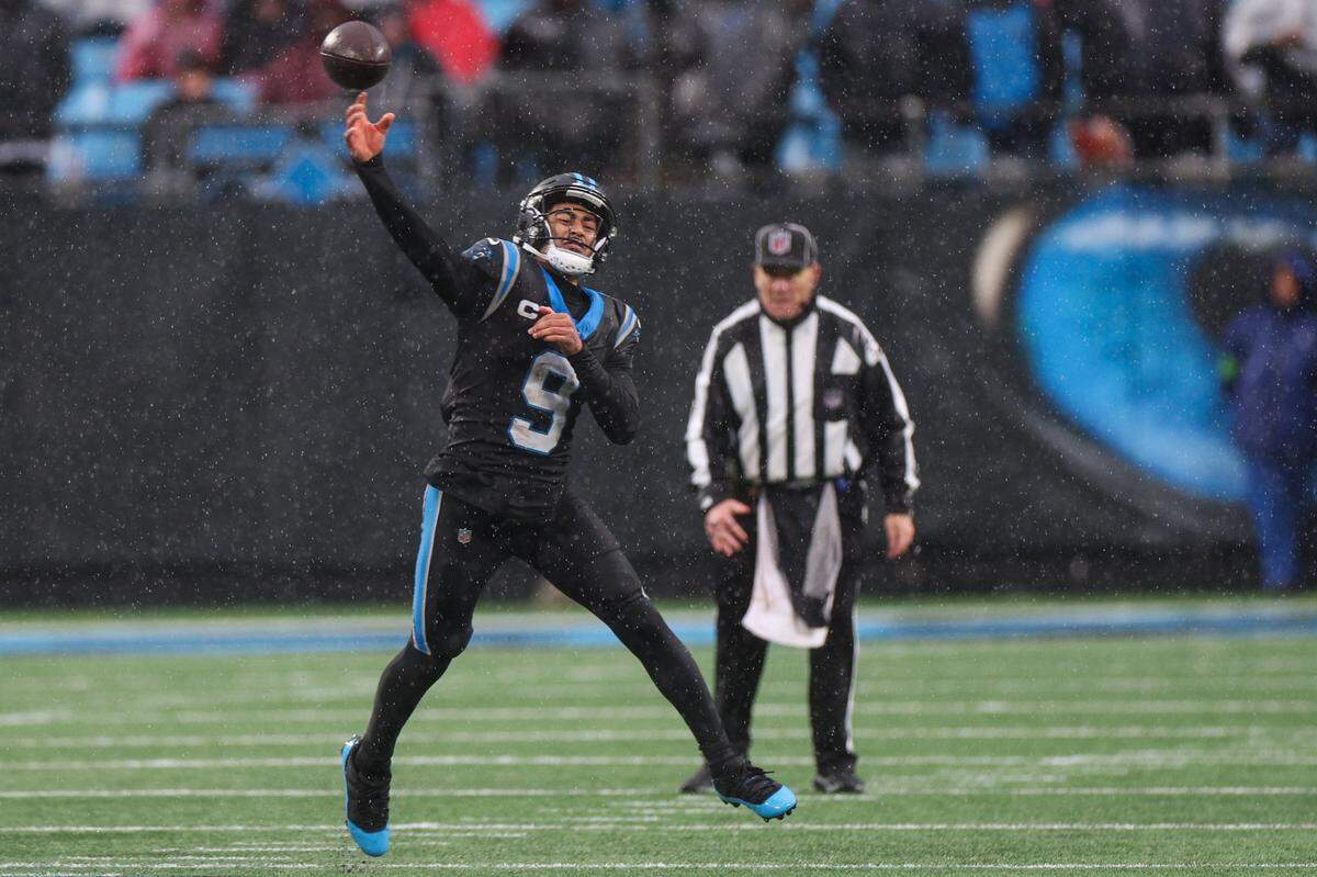 Panthers quarterback Bryce Young throws a long pass during the game against the Falcons at Bank of America Stadium on Sunday, December 16, 2023. The Panthers won, 9-7.