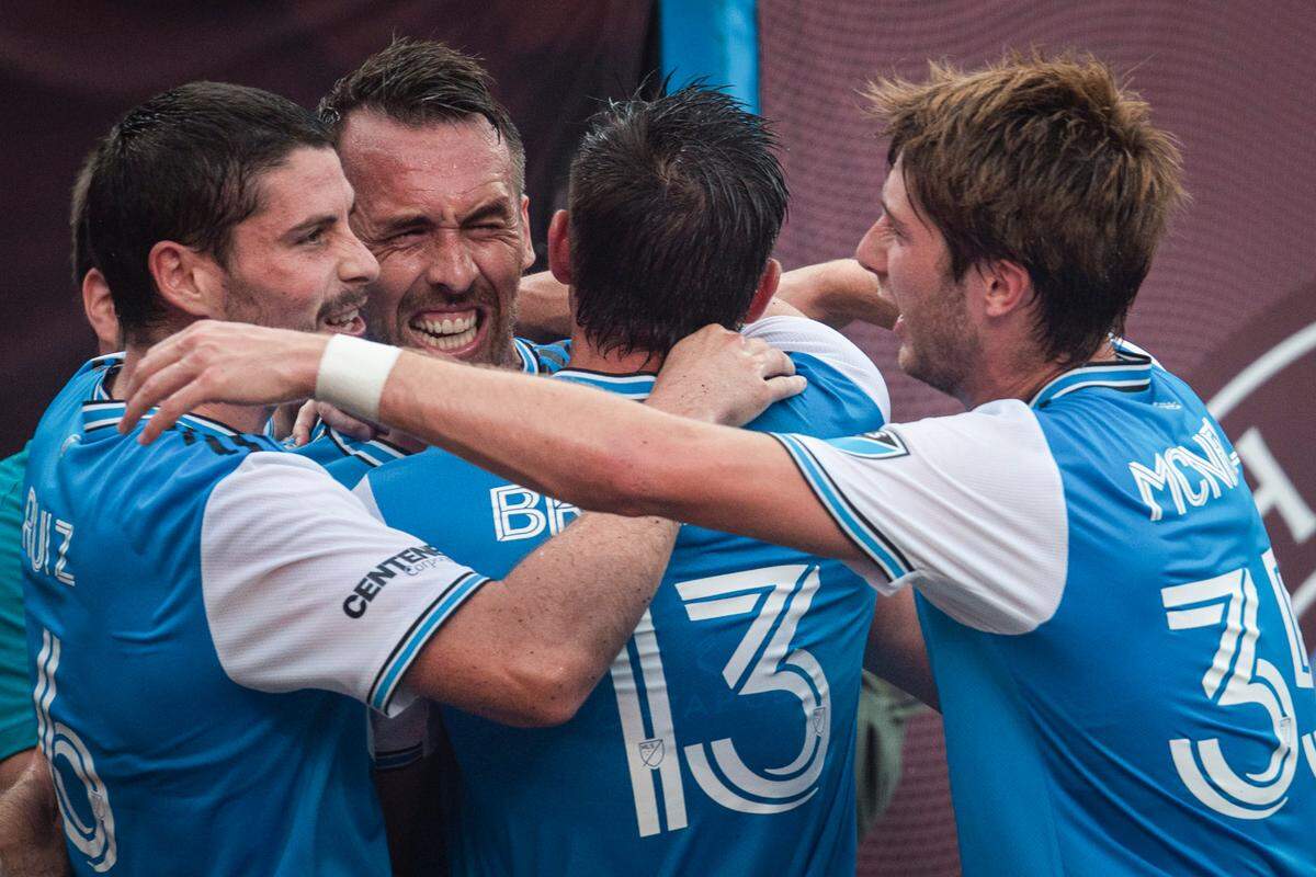 Charlotte FC defender Christian Fuchs (22) celebrates a goal with his teammates during a match against Nashville SC at Bank of America Stadium in uptown Charlotte, N.C. on Saturday, July 9, 2022. Charlotte FC won the match 4 to 1.