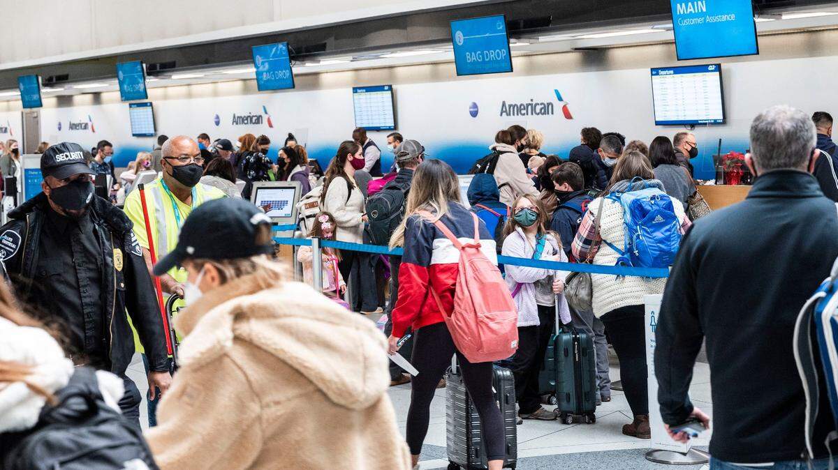 Crowds of people traveling for the Thanksgiving holiday at Charlotte Douglas International Airport on Tuesday, November 23, 2021 in Charlotte, NC.
