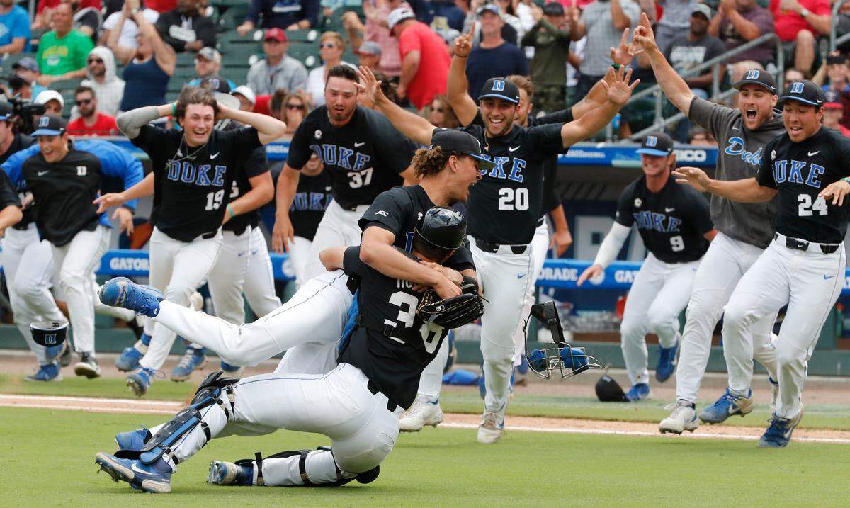 The Duke Blue Devils celebrate clinching the ACC Baseball Championship at Truist Field in Charlotte on May 30, 2021. The college baseball tournament returns to uptown this week.
