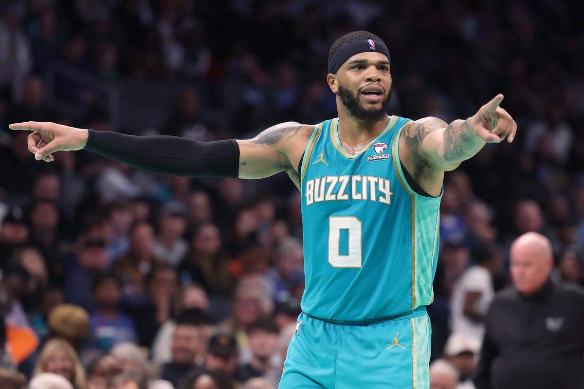 Charlotte Hornets forward Miles Bridges guides his teammates during second-half action against the Dallas Mavericks on Tuesday, April 9, 2024 at Spectrum Center in Charlotte, NC. The Mavericks defeated the Hornets 130-104.