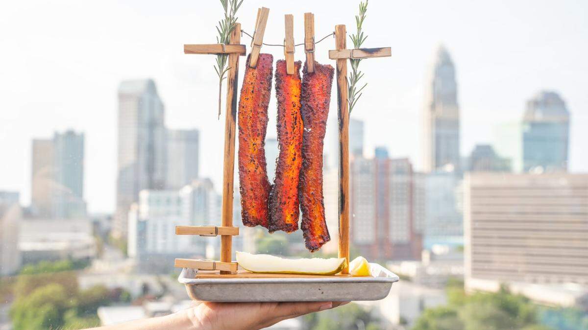 Just look at that bacon grease drip from the DB Maple Glazed Bacon Clothesline at Cloud Bar by David Burke.