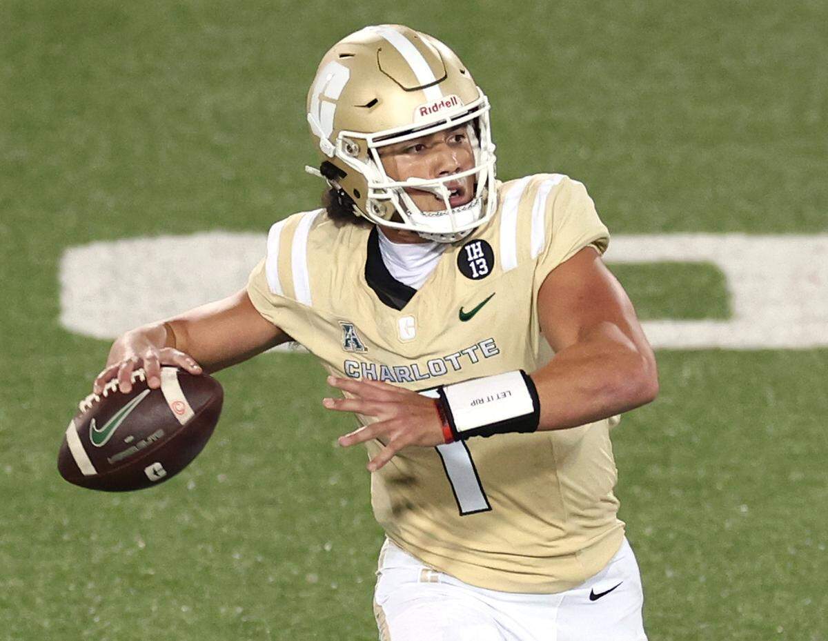 Charlotte 49ers quarterback Max Brown drops back to pass to a receiver during action against Tulane on Thursday, October 31, 2024 at Jerry Richardson Stadium in Charlotte, NC.