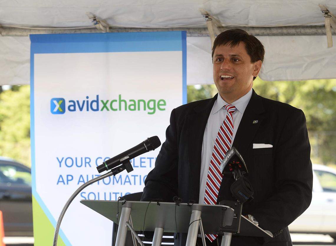 Michael Praeger, AvidXchange founder and chief executive officer, speaks during the groundbreaking ceremony for the new AvidXchange headquarters in 2015.