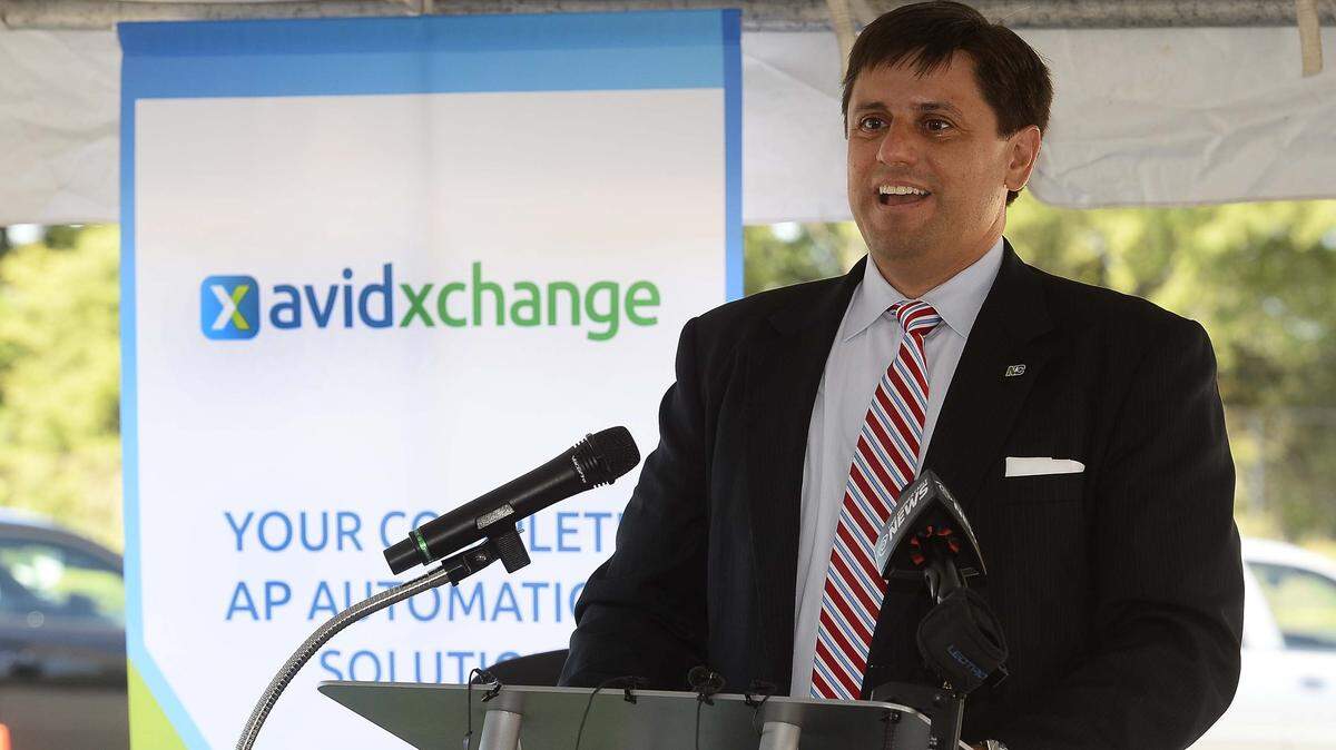 Michael Praeger, AvidXchange founder and chief executive officer, speaks during the groundbreaking ceremony for the new AvidXchange headquarters in 2015.