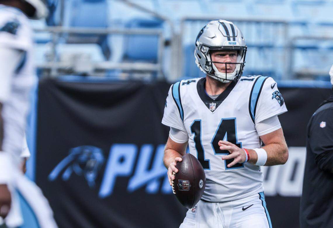 Carolina Panther quarterback Sam Darnold looks to pass during warmups at Bank of America Stadium in Charlotte Saturday.