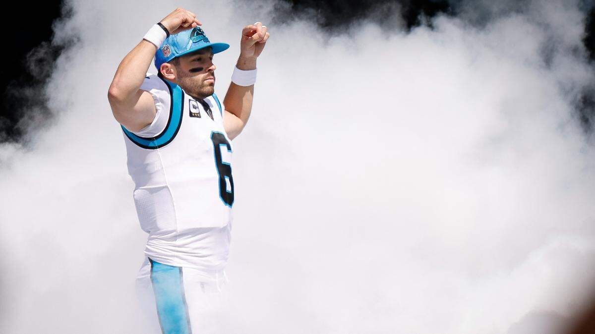 Carolina Panthers quarterback Baker Mayfield runs onto the field before his team’s game against the Cleveland Browns at Bank of America Stadium in Charlotte, NC, on Sunday, Sept. 11, 2022.