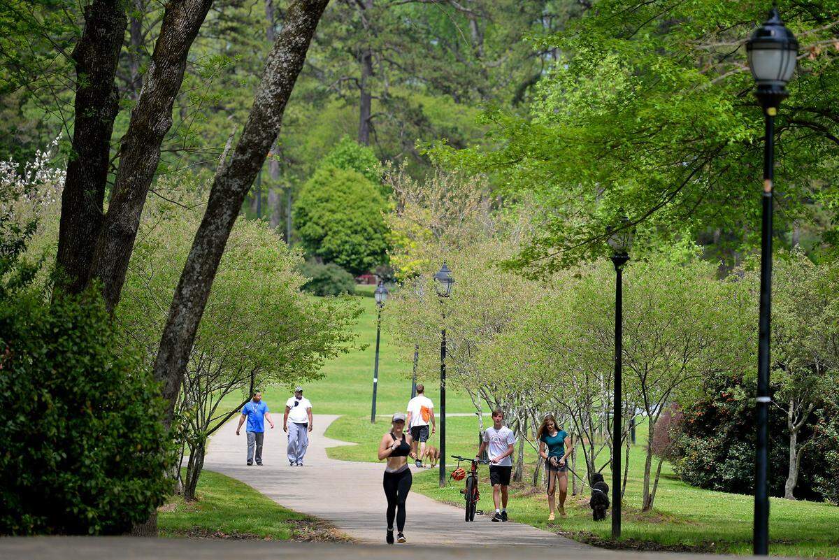 With the temperature in the low 80s, people enjoy the spring weather at Freedom Park in Charlotte, NC on Tuesday, April 7, 2020. 