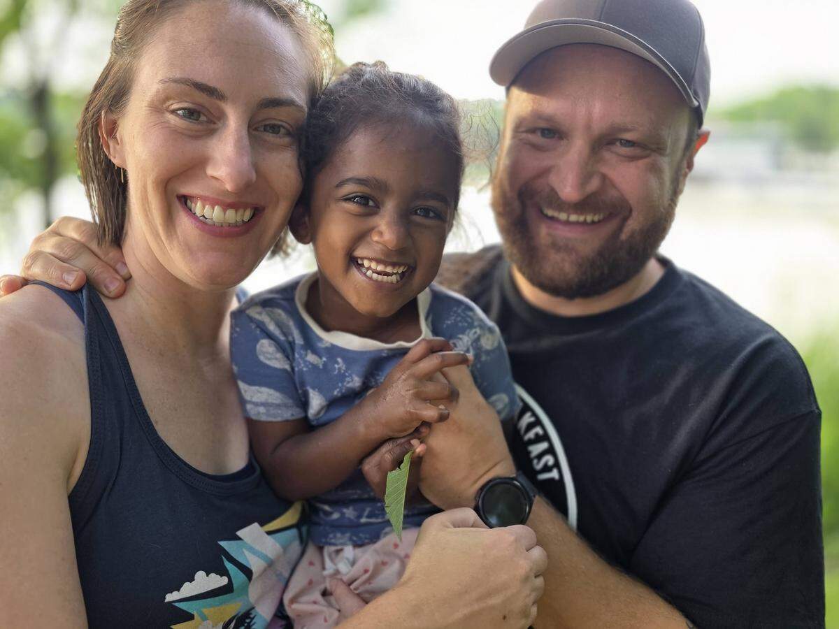 Heather Patrek with her husband Nick, right, and their daughter Eva, photographed in July 2025.