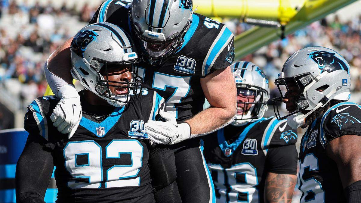 Panthers defensive tackle Jonathan Harris (92) celebrates recovering the Cardinals’ fumbled ball during the game at Bank of America Stadium in Charlotte, NC on Sunday, December 22, 2024.